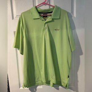 Greg Norman green polo